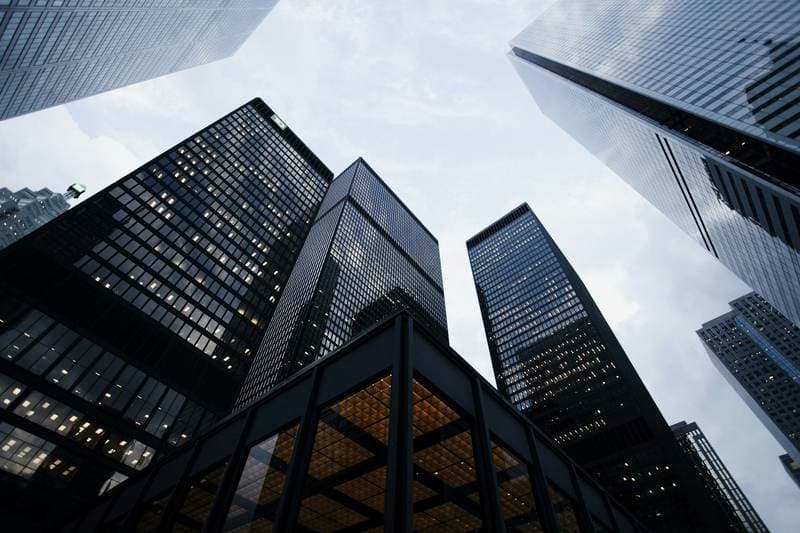 Glass and concrete held as a single elevation.